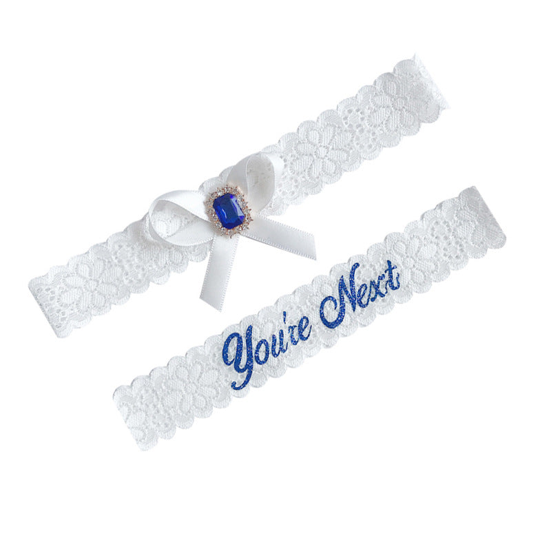 Handmade bridal garter blue rhinestone bow