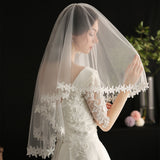 Lace rows of flowers bride long veil