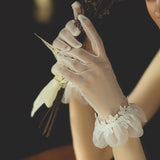 Short tulle delicate bridal gloves